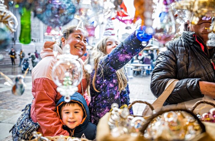 Shoppers admire Christmas ornaments at the OCC Christkindlmarket, one of the largest holiday markets in Colorado Springs.