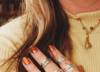 MountInspire A woman's hand with rings from MountInspire new boutique in downtown Colorado Springs.