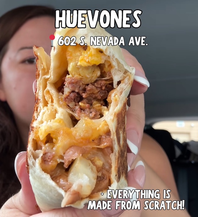 Cheesy breakfast burrito last Huevones in Colorado Springs held by @actuallyitsmeagan