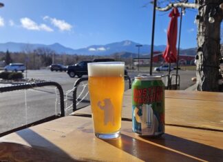 105 West at Garden of the Gods Beers on the patio at 105 West Brewing at Garden of the Gods, with view of Pikes Peak.