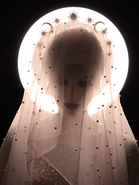 Figure in celestial fashion by artist Aaron Graves for the House of GOCA Stardust wearable art show.