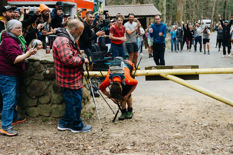 Jasmin Paris' crosses the finish line at the grueling 2024 Barkley Marathons, a groundbreaking achievement chronicled in The Finisher. The film is part of the Banff Mountain Film Festival World Tour. Photo by Drew Darby.