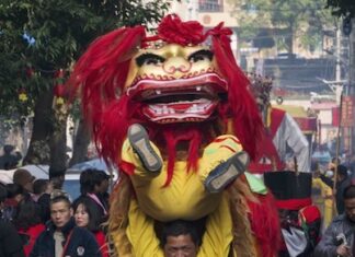 Jolie Nails and Spa Traditional Asian dragon dancers.