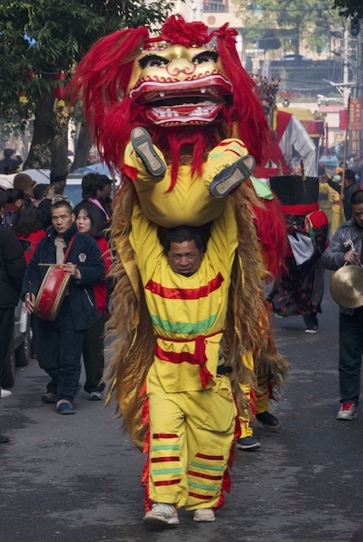 Traditional Asian dragon dancers. 