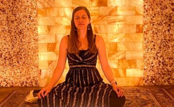 A woman meditates during halotherapy at the Colorado Salt Cave Wellness Center, which is part of the Visit Colorado Springs Wellness Pass.
