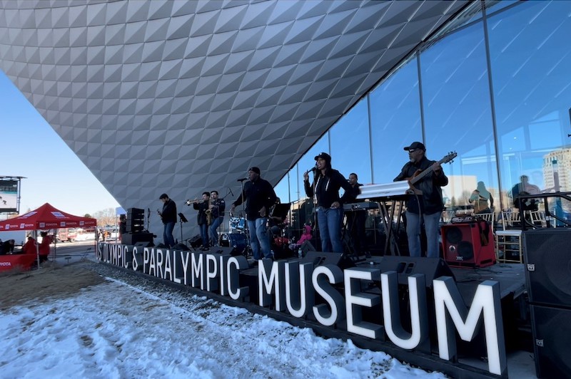 Soul School plays live music in front of the U.S. Olympic and Paralympic Museum during Downtown Winter Fest to celebrate the Winter Olympics.