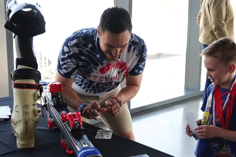 Olympian Tyler Carter signs autographs at a meet and greet at the U.S. Olympic and Paralympic Museum. 