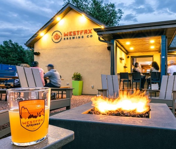 A beer by the fire pit at WestFax Springs brewery in Colorado Springs.
