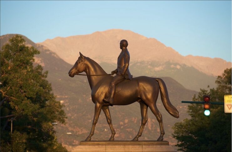 The Gen. William J. Palmer statue in downtown set against Pikes Peak on the horizon is symbolic of the America 250 - Colorado 150 Sesquisemiquincentennial celebration.