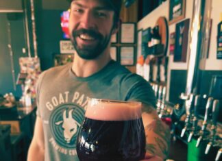 Goat Patch Releases Official MeadowGrass Festival Beer A Goat Patch bartender hands over an official MeadowGrass festival beer for 2026.