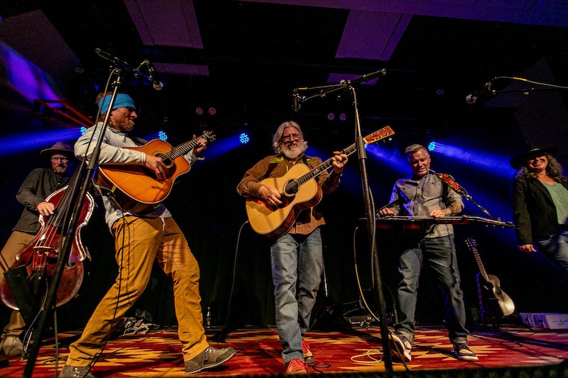 The Nershi Hann Trio play live on stage. 