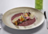 The 30 Best Restaurants in Colorado Springs Steak and beet salad at Roth's Sea and Steak, one of the best restaurants in Colorado Springs.