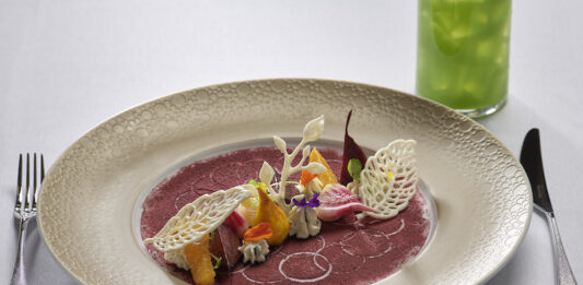The 30 Best Restaurants in Colorado Springs Steak and beet salad at Roth's Sea and Steak, one of the best restaurants in Colorado Springs.