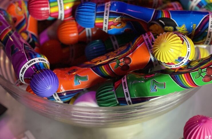 Rainbow colored bingo daubers at Icons, where they host weekly Drag Bingo in Colorado Springs