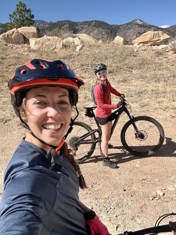 Leslie McCright mountain bikes with a friend in Red Rock Canyon Open Space. Photo courtesy of Leslie McCright.