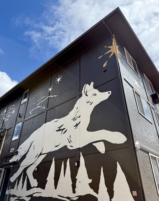 Coyote mural on the side of the new Outrider Hotel in Manitou Springs