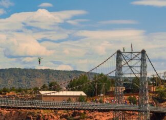 An athlete highlining over the Royal Gorge Bridge.