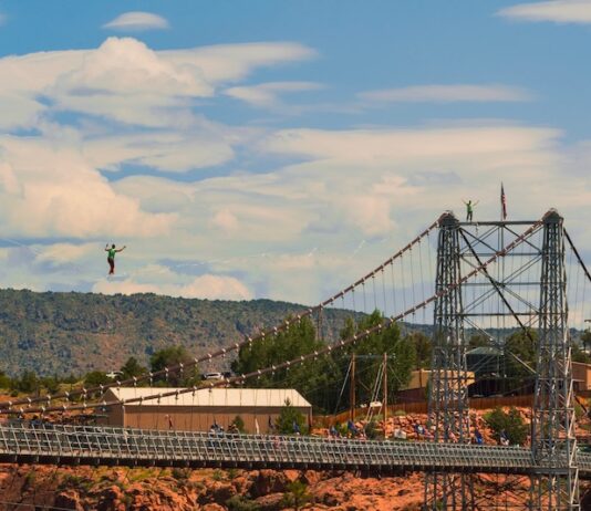 Gap the Gorge Strings Slacklines Across the Royal Gorge An athlete highlining over the Royal Gorge Bridge.