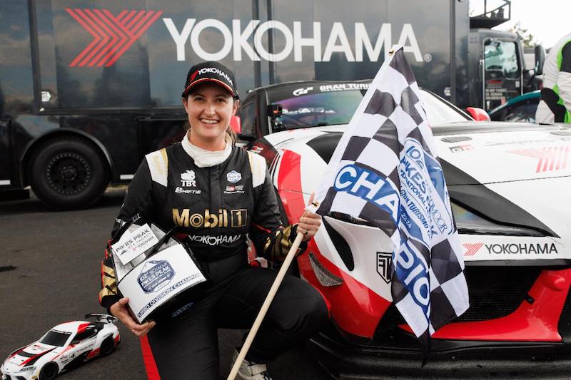 Laura Hayes celebrates her division win at the Pikes Peak Hill Climb.