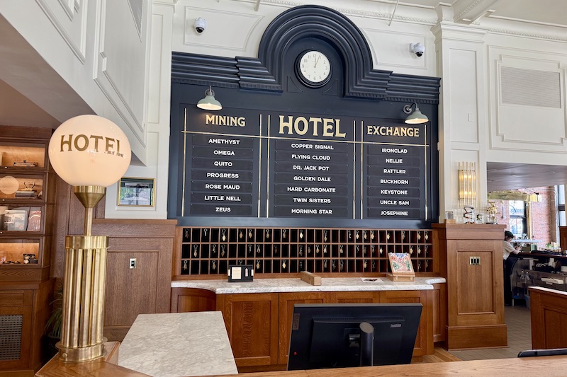 The stock trading board behind the front desk at The Mining Exchange Hotel. 