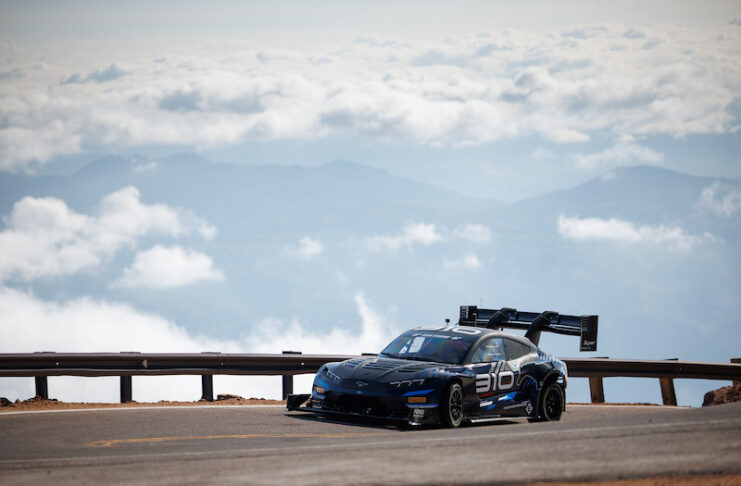Romain Dumas on the course above the clouds in the 2025 Pikes Peak International Hill Climb.