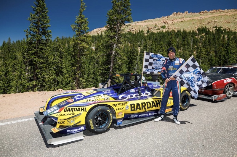 Simone Faggioli and car celebrate his King of the Mountain 2025 victory