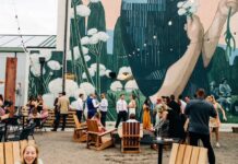 Kinship Landing Celebrates Five Years of Community Near and Far A wedding reception in The Yard at Kinship Landing boutique hotel in Colorado Springs.
