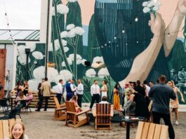 Kinship Landing Celebrates Five Years of Community Near and Far A wedding reception in The Yard at Kinship Landing boutique hotel in Colorado Springs.