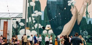 Kinship Landing Celebrates Five Years of Community Near and Far A wedding reception in The Yard at Kinship Landing boutique hotel in Colorado Springs.