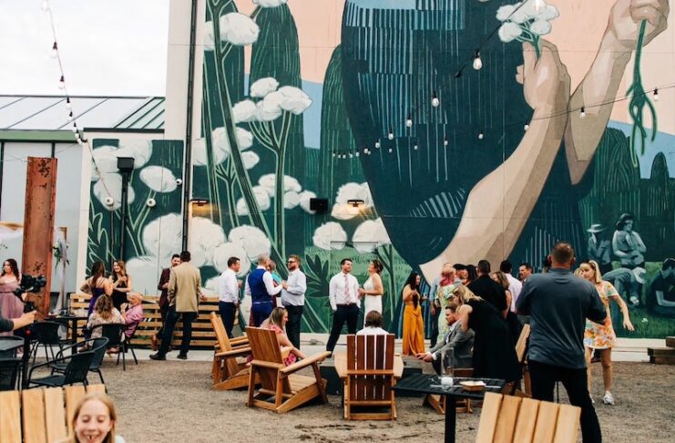 A wedding reception in The Yard at Kinship Landing boutique hotel in Colorado Springs.