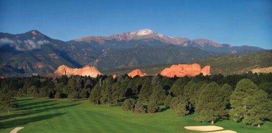 Hit ‘Em Straight: A Guide to Golf Courses in Colorado Springs and Beyond Overview of Kissing Camels Golf Club at Garden of the Gods Resort with Pikes Peak and Garden of the Gods in the background