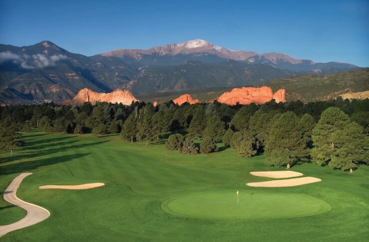 Overview of Kissing Camels Golf Club at Garden of the Gods Resort with Pikes Peak and Garden of the Gods in the background