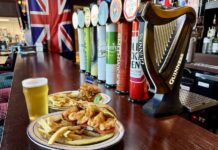 The Brit Pub Collabs on Shinedown Sandwiches Shinedown hot sauce sandwiches on the bar at the Brit Pub in Colorado Springs.