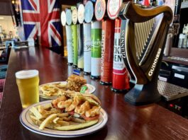 The Brit Pub Collabs on Shinedown Sandwiches Shinedown hot sauce sandwiches on the bar at the Brit Pub in Colorado Springs.