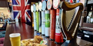 The Brit Pub Collabs on Shinedown Sandwiches Shinedown hot sauce sandwiches on the bar at the Brit Pub in Colorado Springs.