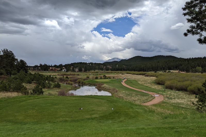 Tee view on hole 17 at Shining Mountain Golf Course in Woodland Park