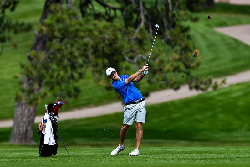 A member of the U.S. Air Force Academy Golf Team hits on the fairway at the Eisenhower Golf Course. 