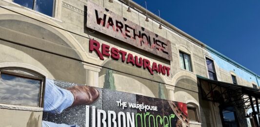 Chef-Driven Warehouse Urban Grocer Adds Unique Dining Dimension The Exterior of The Warehouse Urban Grocer in downtown Colorado Springs.