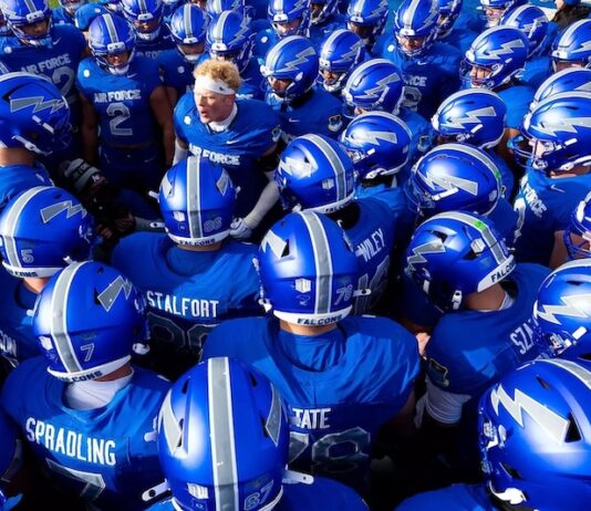 5 Best Things to Do in Colorado Springs This Weekend The Air Force Football team huddles before a game.