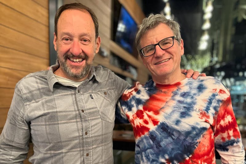 Founders John Krakauer and Josh Paris reunite at Josh and John's 40th anniversary celebration. Photo courtesy of Josh and John's.