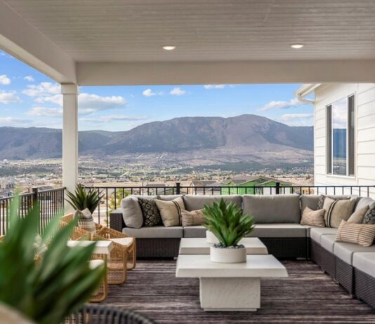 Discover What’s Possible at the 2026 Colorado Springs Parade of Homes A view of the mountains from the patio of a new home in the Colorado Springs Parade of Homes 2026.