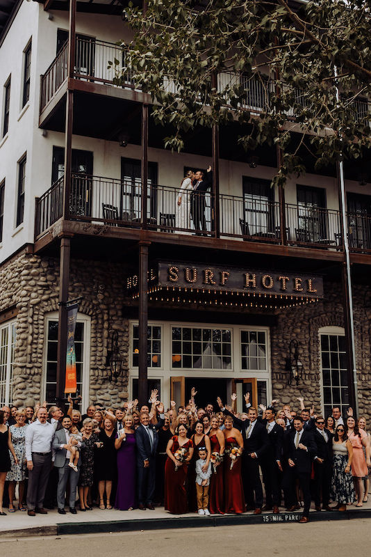 A wedding party gathered at the entrance to Surf Hotel in Buena Vista, Colorado.