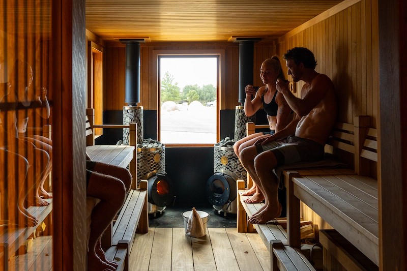 A couple inside the Terraform Sauna in Buena Vista, CO.