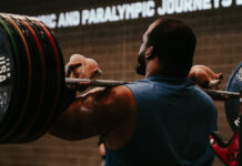 Team USA weightlifter Aaron Williams lifts heavy weights at the U.S. Olympic and Paralympic Training Center in Colorado Springs.