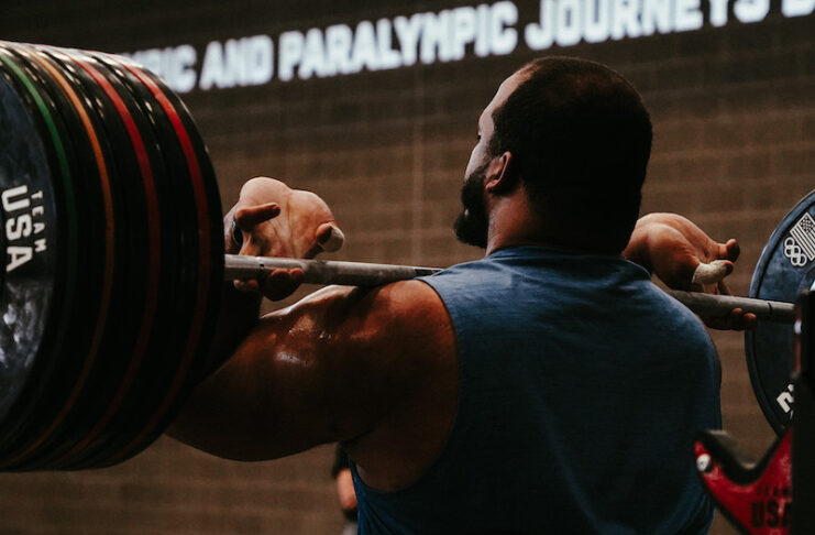 Team USA weightlifter Aaron Williams lifts heavy weights at the U.S. Olympic and Paralympic Training Center in Colorado Springs.
