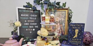 A book and tea display at the new Between the Sips romance bookstore and tea room in Colorado Springs.