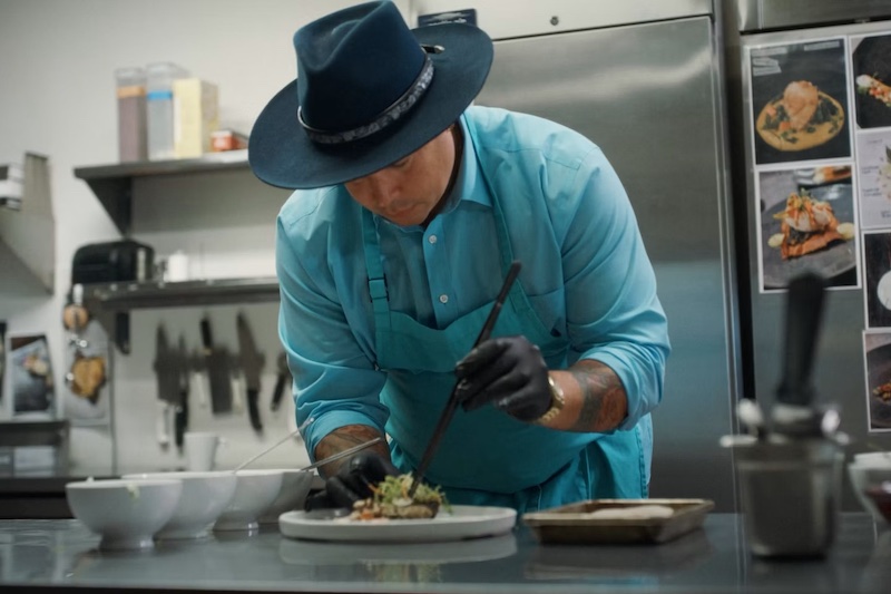 Chef Brother Luck plates a dish in the kitchen of Four by Brother Luck, one of first Colorado Springs Michelin awards winners