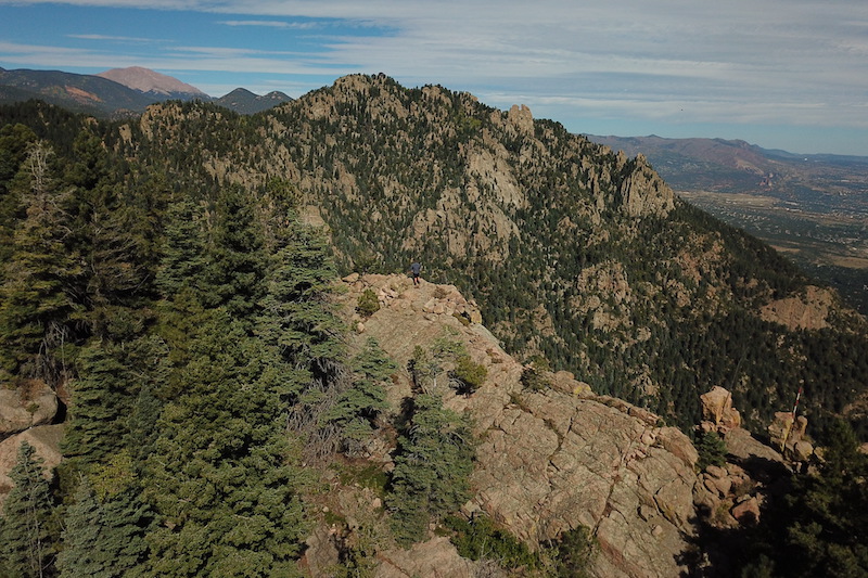 David Deitemeyer of Colorado Springs Parks, Recreation and Cultural Services Department looks down over the new Fishers Canyon Open Space.
