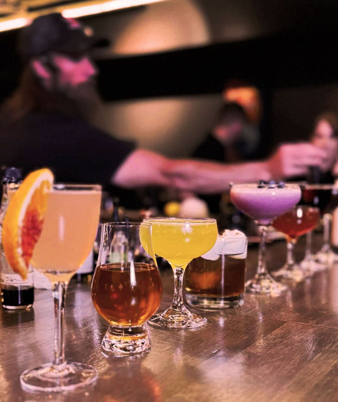 Kyle McNerney, winner of the Michelin Guide Colorado Exceptional Cocktails Award for his work at Four by Brother Luck.