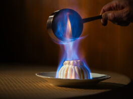 Colorado Springs Has Its First Michelin Award Winners Flambéed Baked Alaska prepared tableside at The Penrose Room at The Broadmoor, one of the first Colorado Springs Michelin awards.